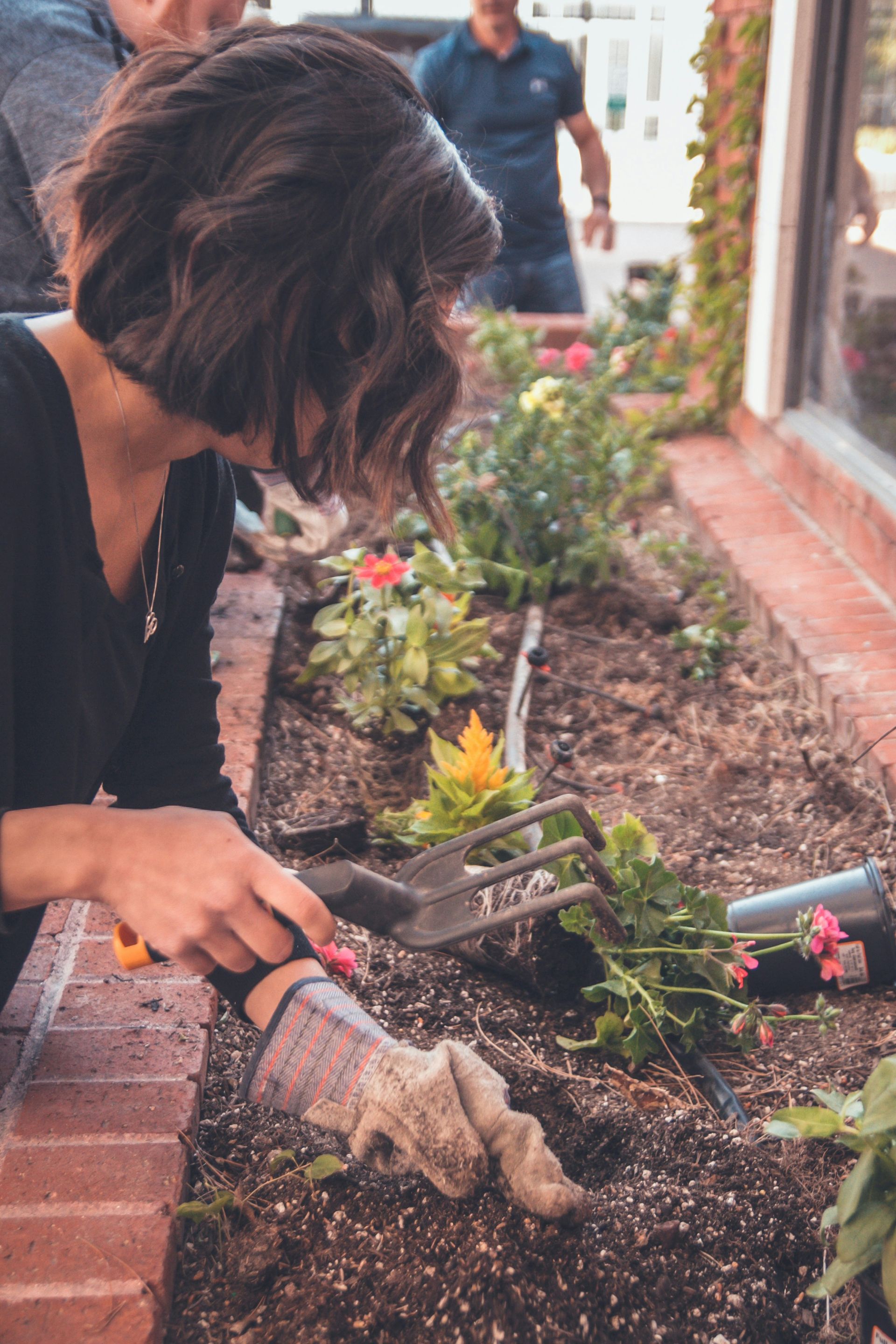 Woman digging in dirt