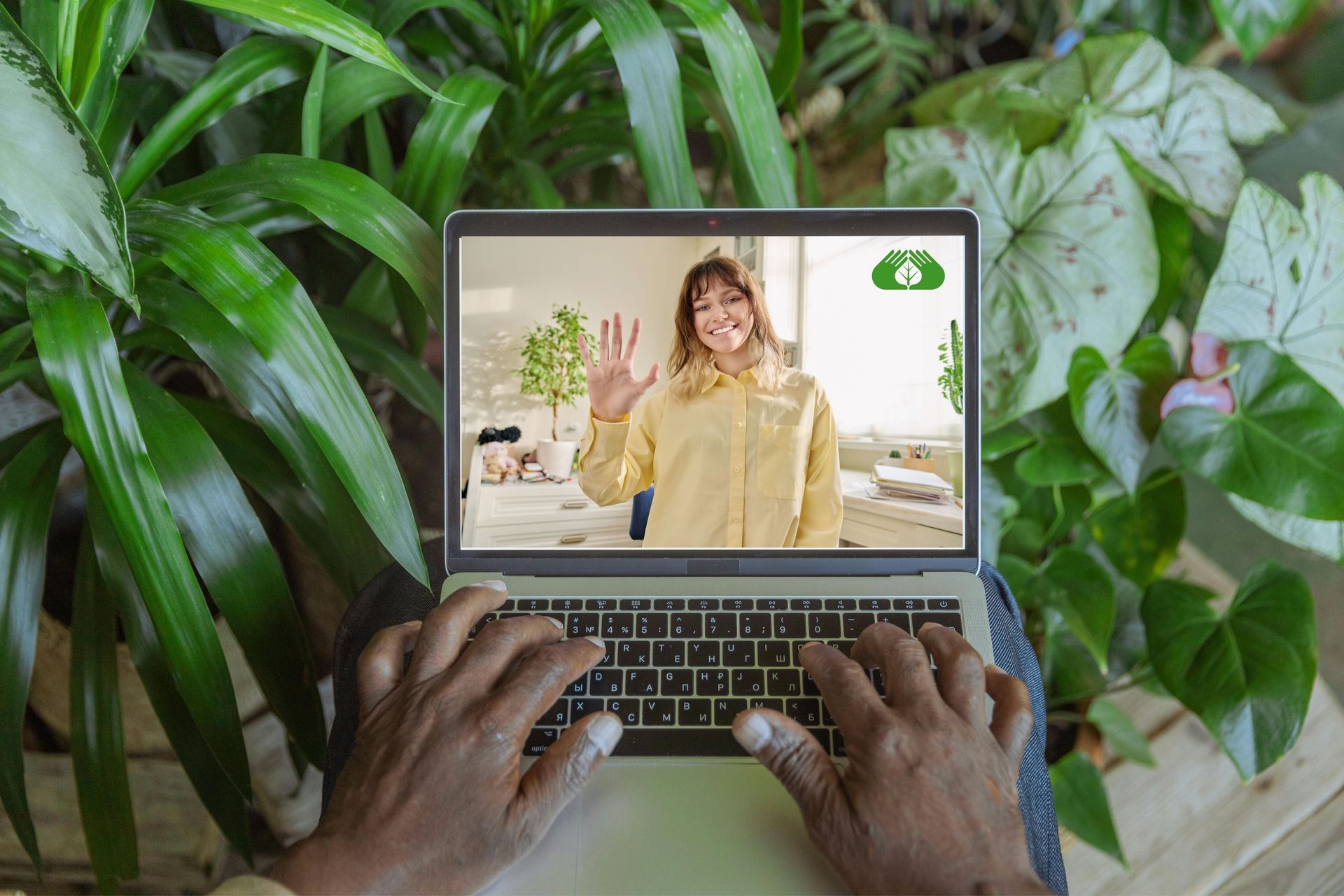 AHTA webinar on screen; hands on laptop