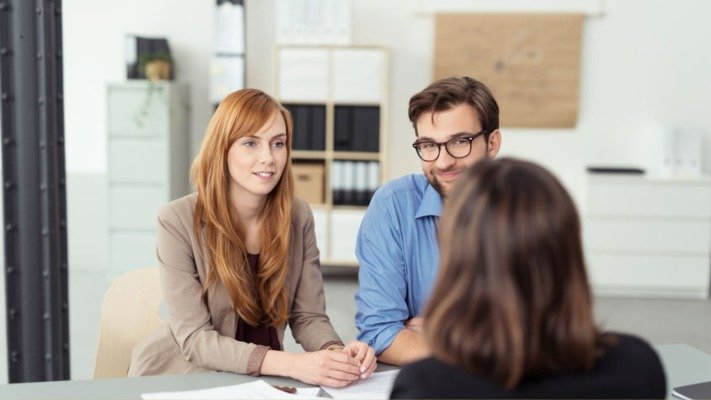 two people talking to a dental office 