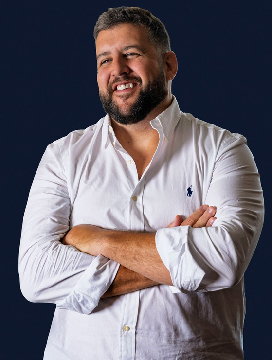 Lanson Partners team posing for a picture while sitting at a table