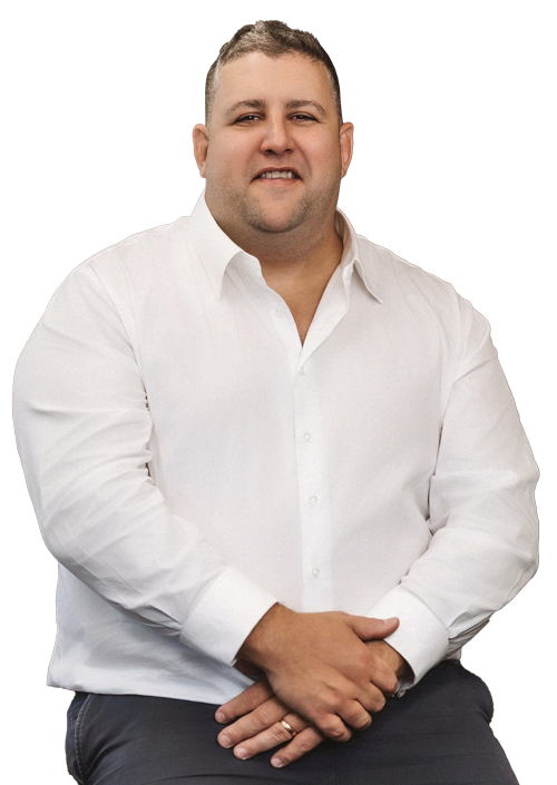 Lanson Partners team posing for a picture while sitting at a table