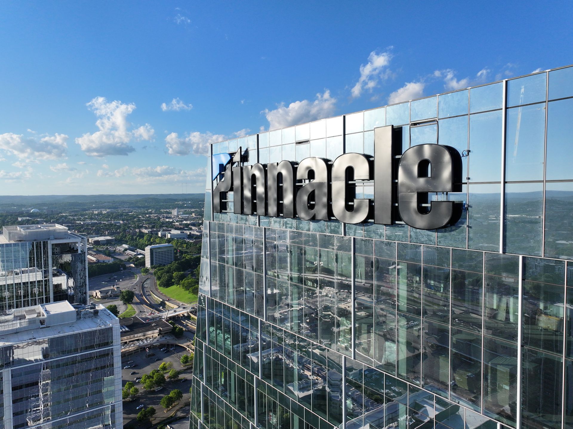 An aerial view of a building with the word miracle on it