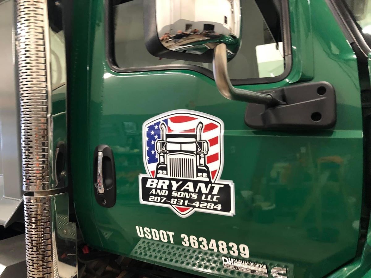A green truck from bryant and sons llc