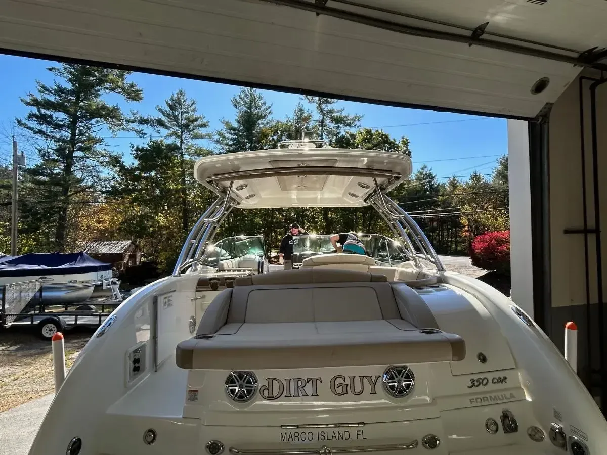 Back view of a white boat,