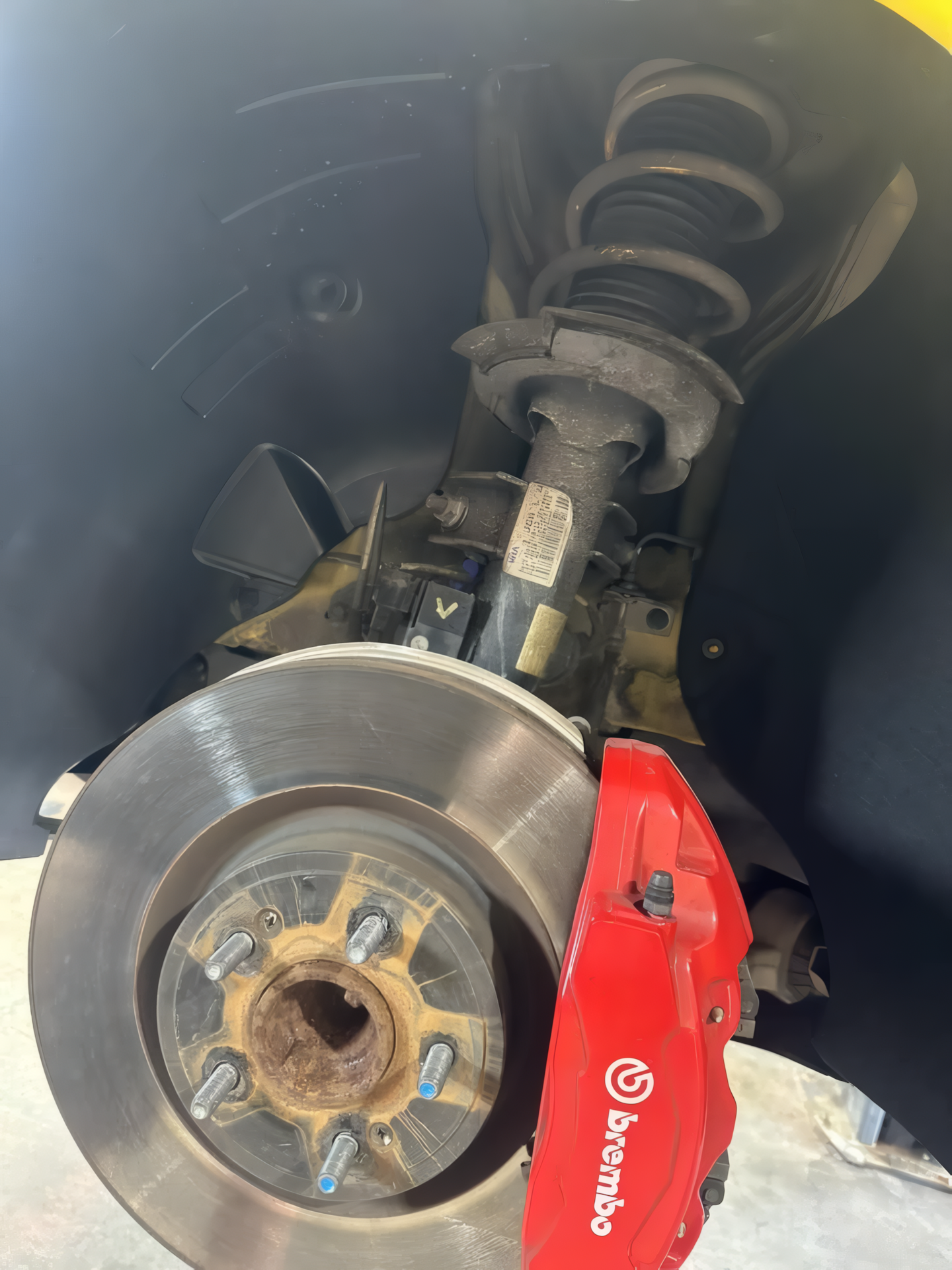 A Close Up of a Shock Absorber on a Car — H.M. Mechanical in Drayton, QLD