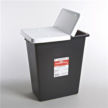 A black trash can with a white lid is sitting on a white surface.