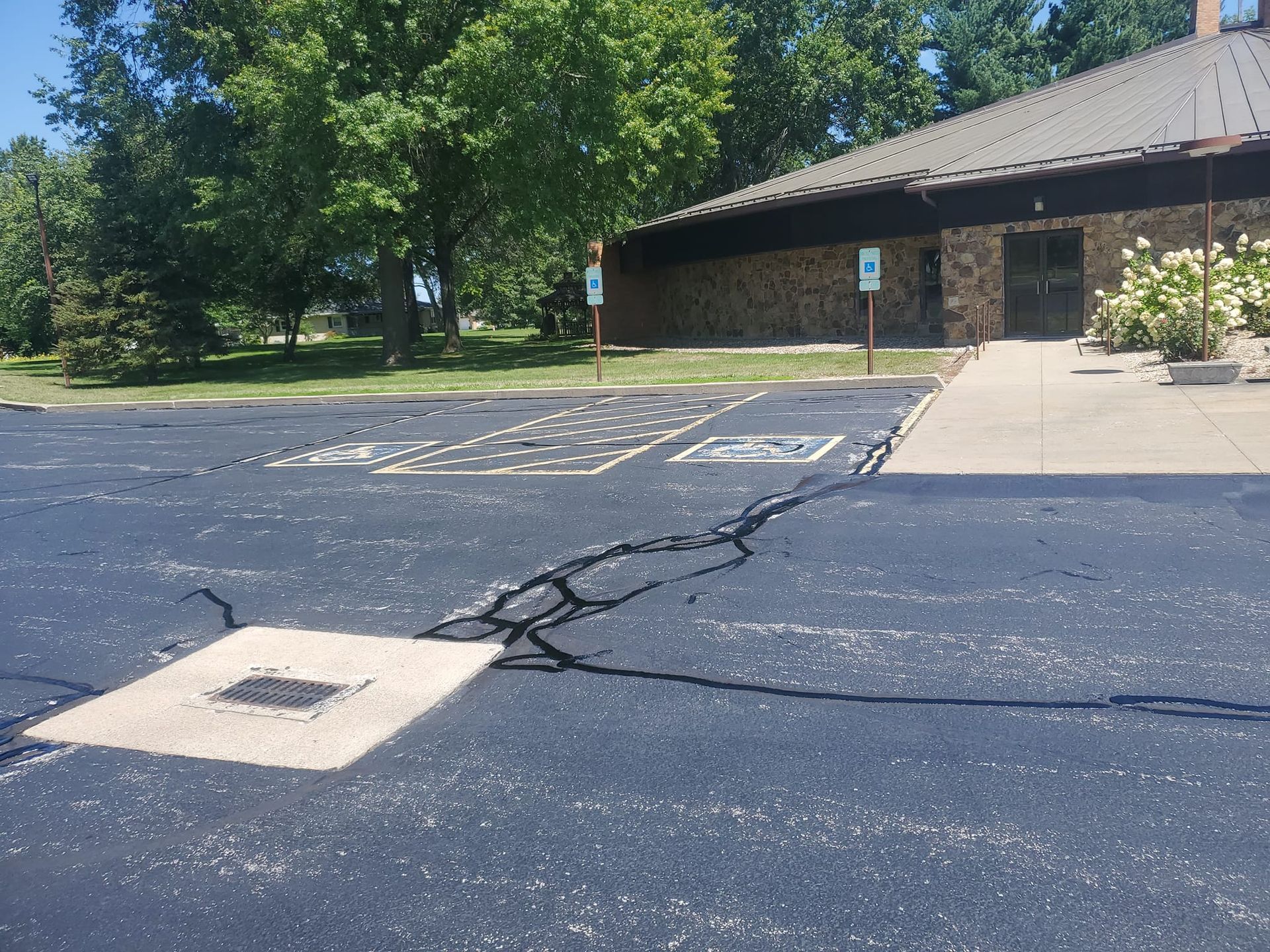 A handicapped parking spot in front of a building