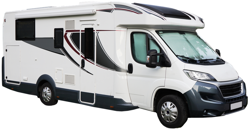 White and gray recreational vehicle with black accents, parked.
