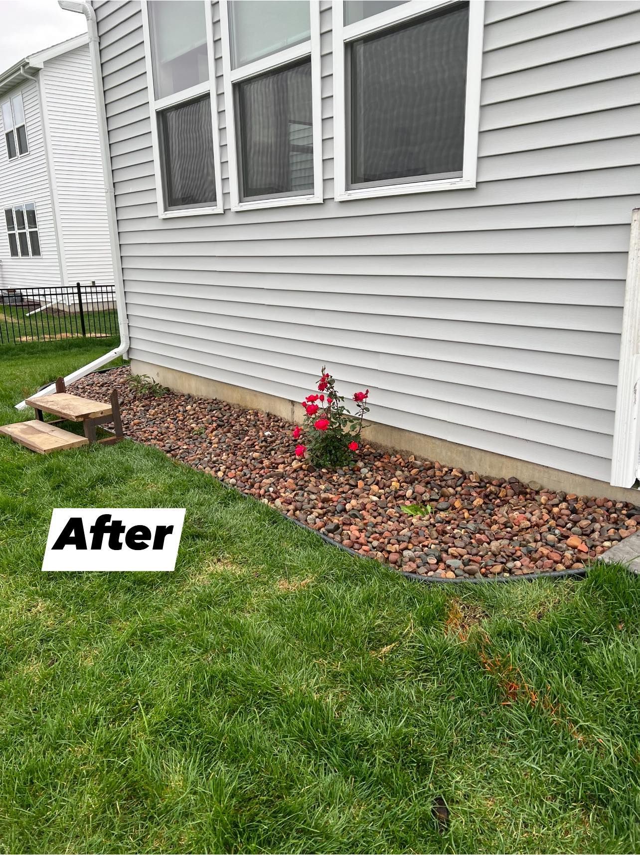 A house with a sign that says `` after '' in front of it.