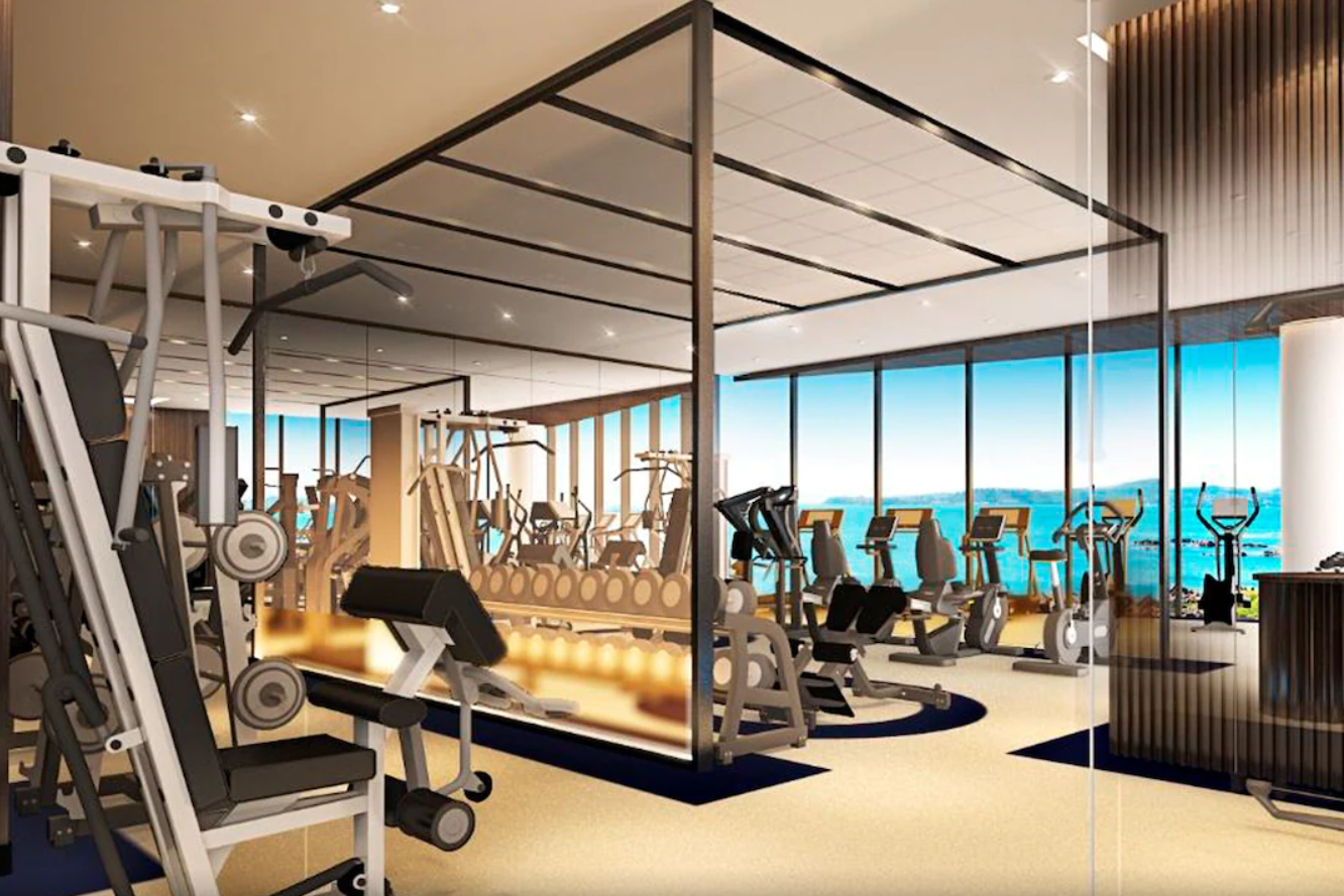 An artist 's impression of a gym with a view of the ocean.