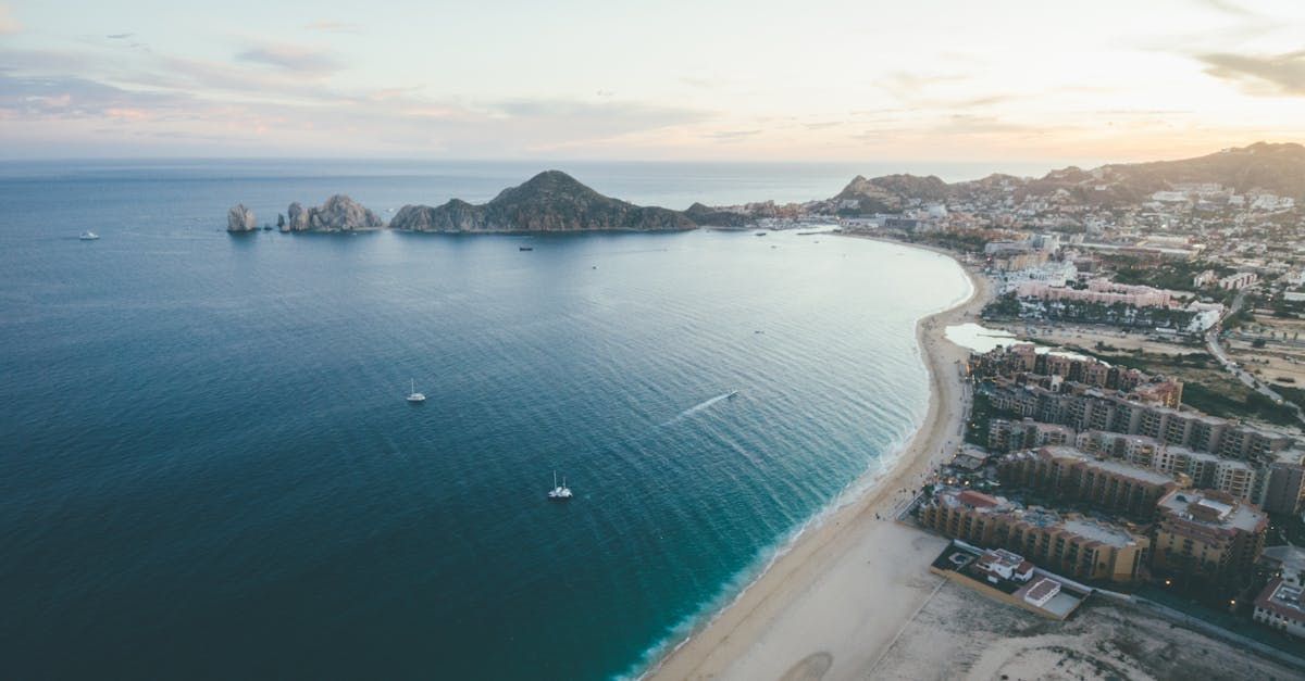 An aerial view of a large body of water with a city in the background.
