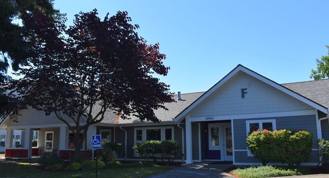 A house with the letter f on the front of it