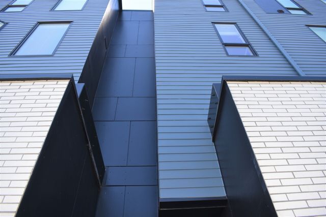A building with a lot of windows and stairs