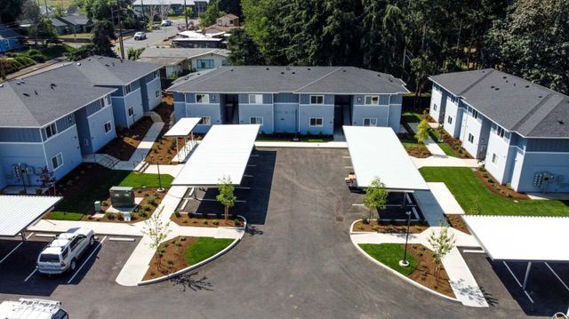 An aerial view of a row of apartment buildings