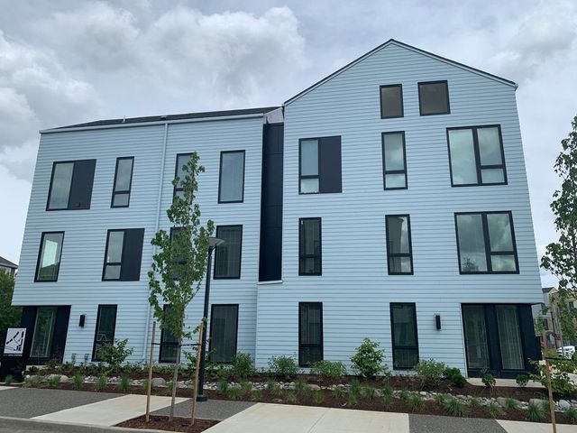 A large white building with a lot of windows