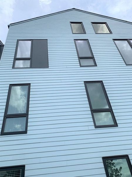 A large building with a lot of windows on it.