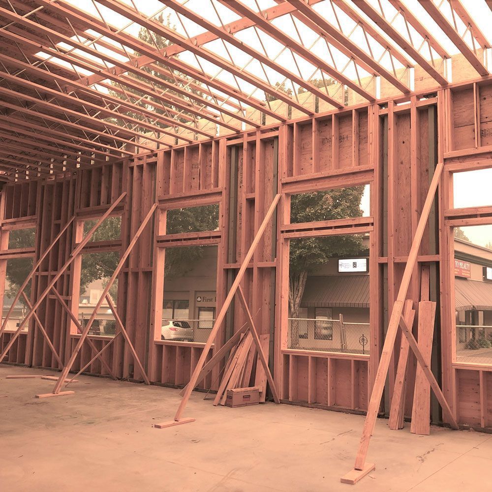 A building under construction with a lot of windows