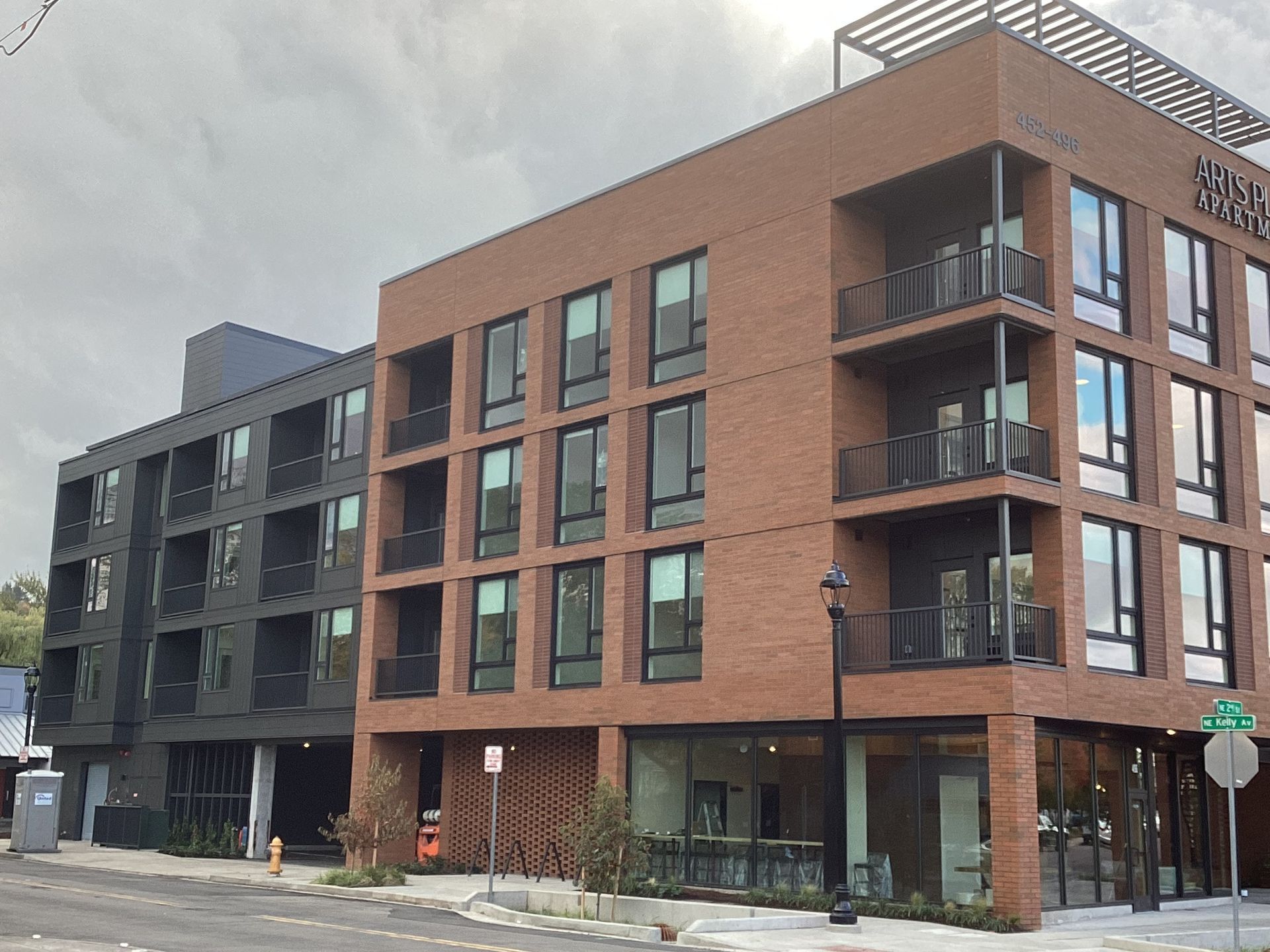 A large brick building with a lot of windows and balconies