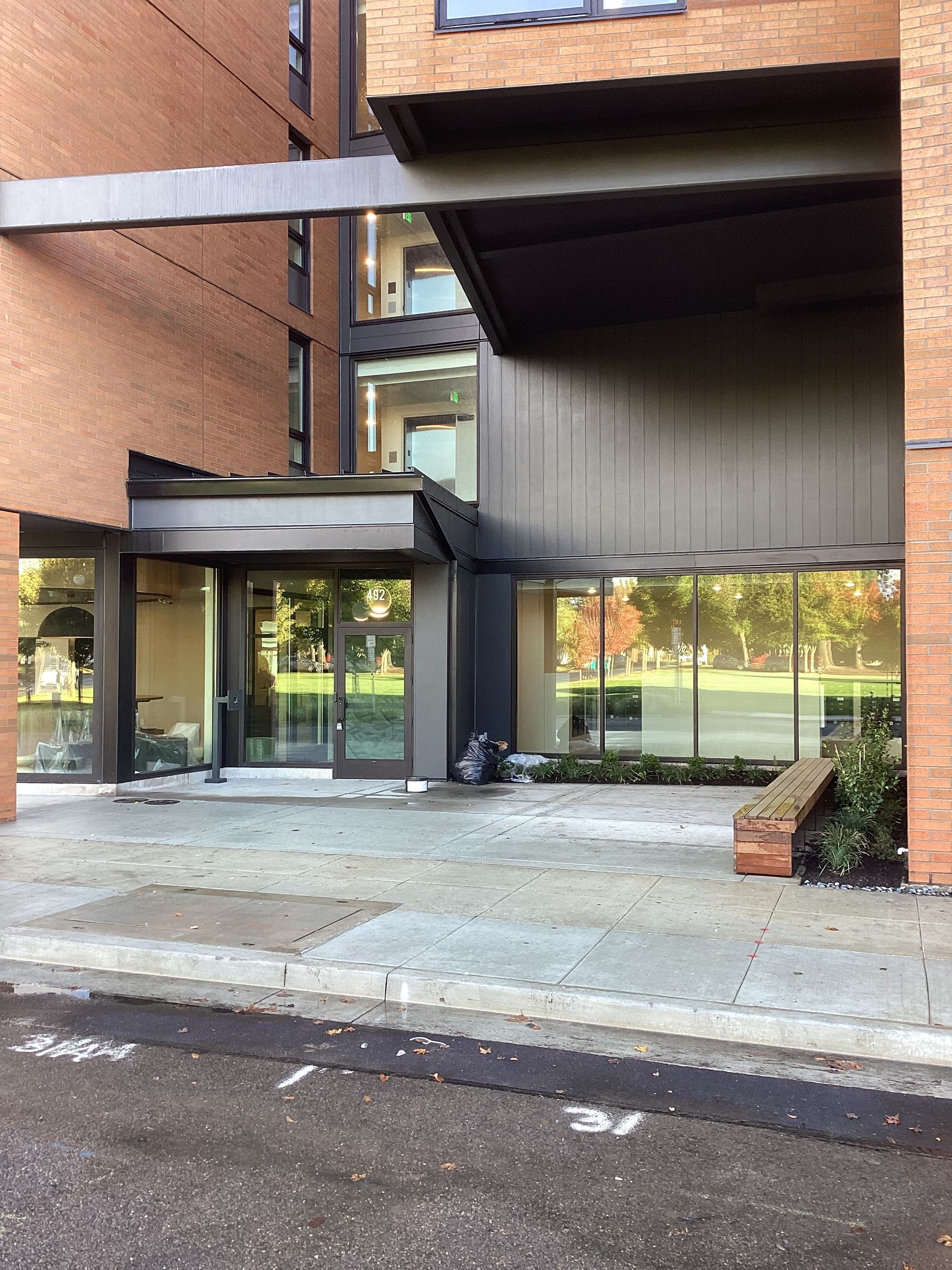 A large brick building with a large glass door