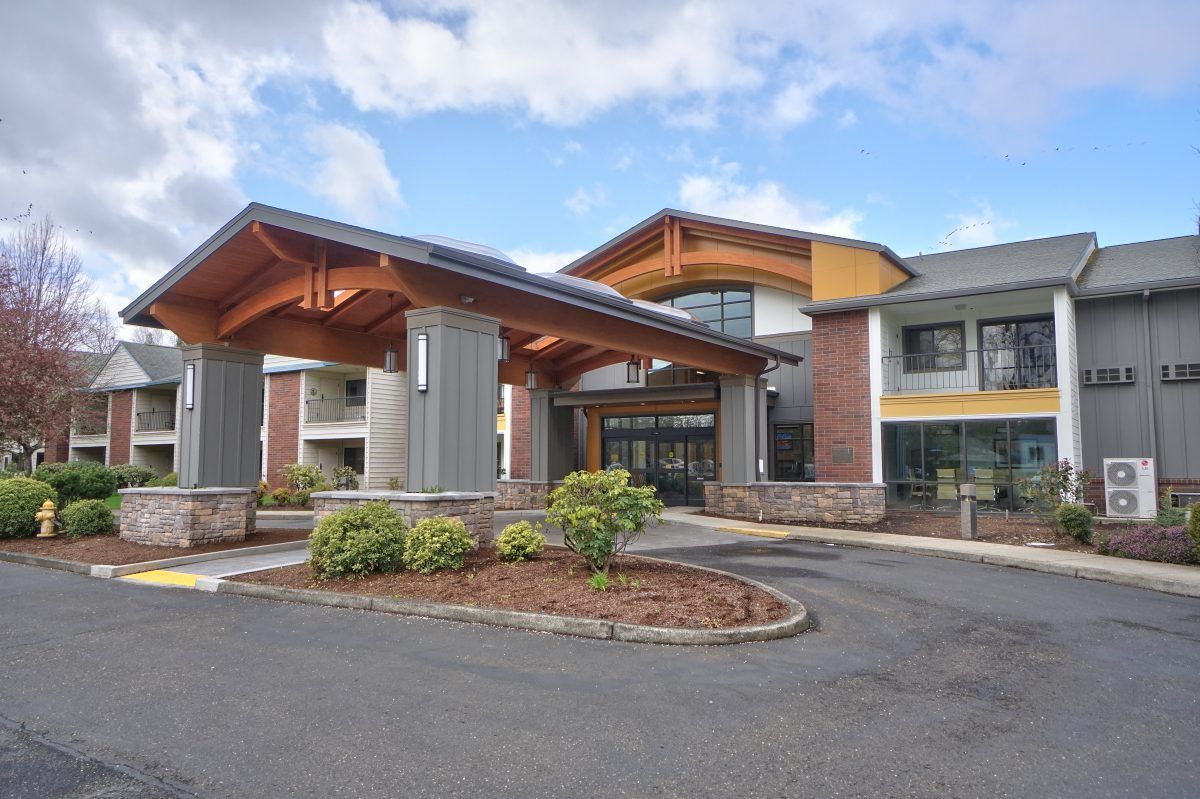 A large building with a fire hydrant in front of it.