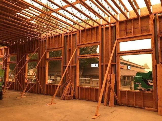 A building under construction with a lot of windows