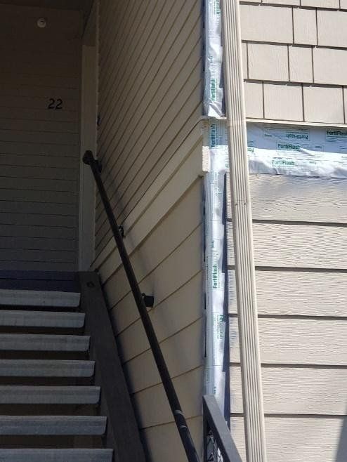 Stairs leading up to a building with the number 22 on it