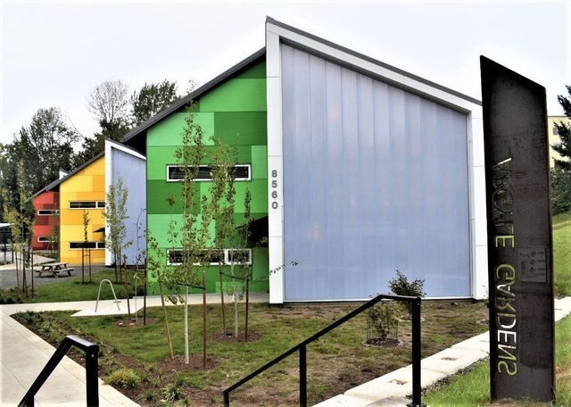A colorful building with a sign that says welcome