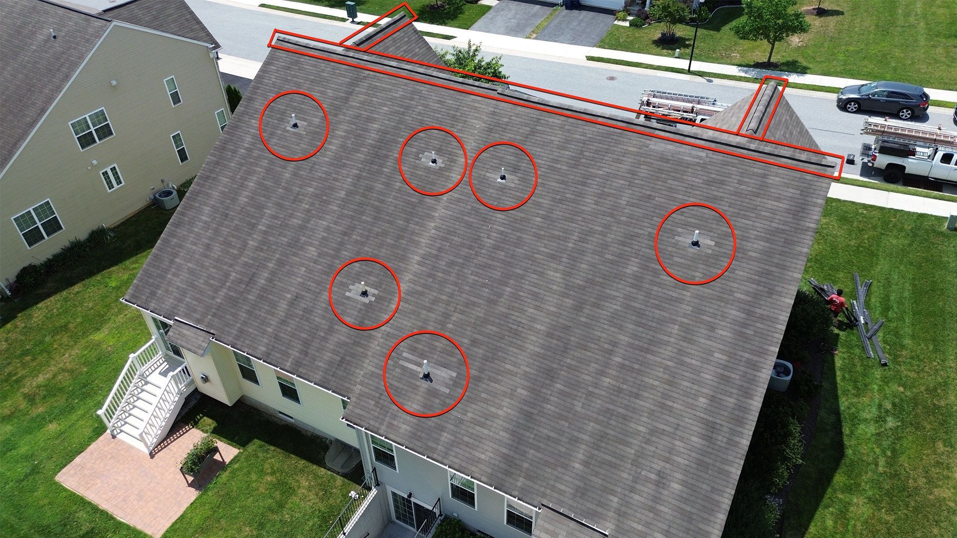 Aerial roof inspection in Westminster, Maryland showing roof penetrations, ridge line, and shingle conditions evaluated during a professional roof inspection.