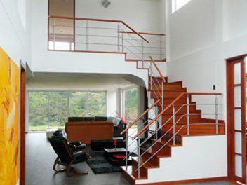 Baranda en acero inoxidable y madera