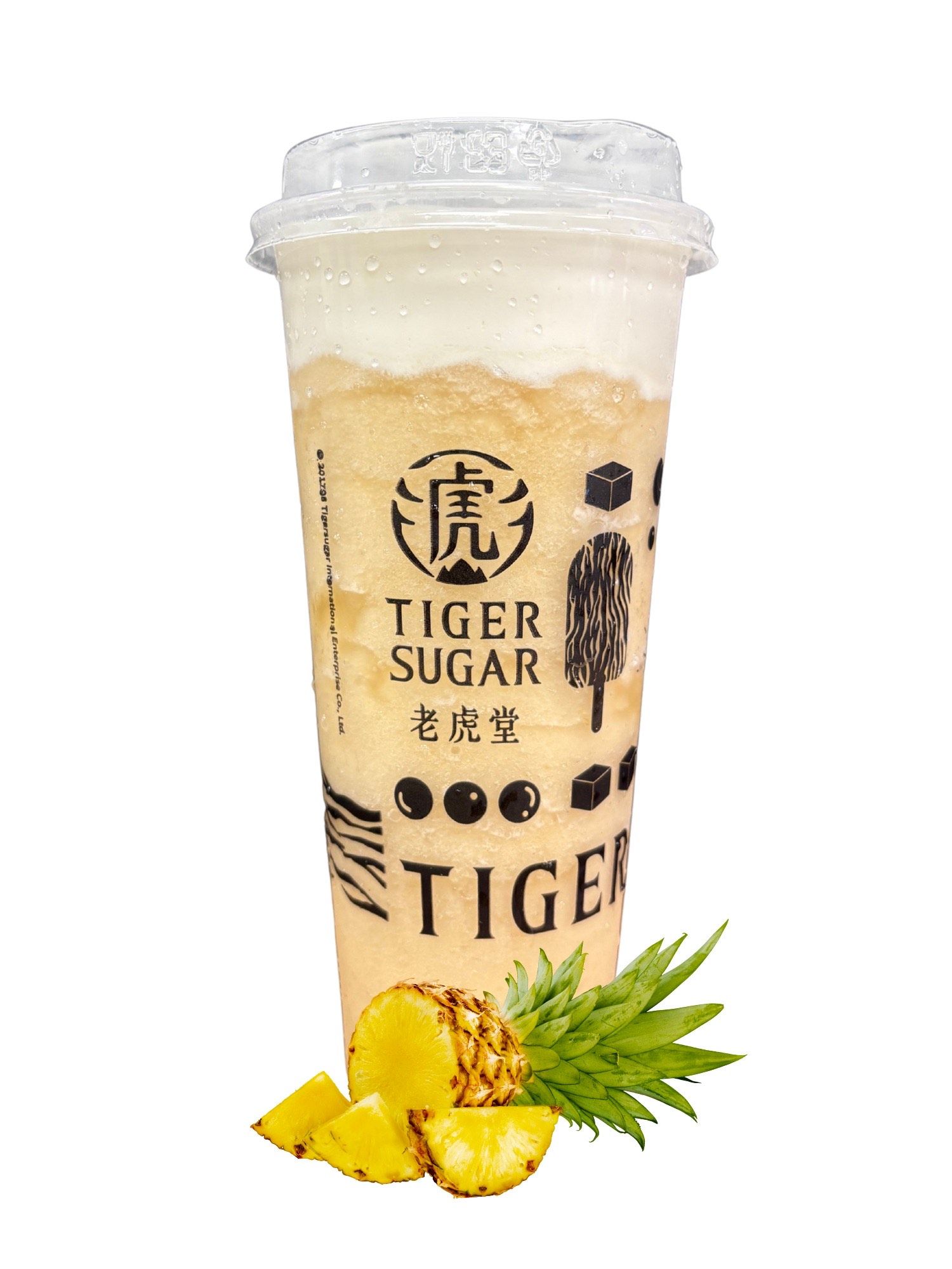 Tiger Sugar pineapple drink in a clear cup with pineapple slices.