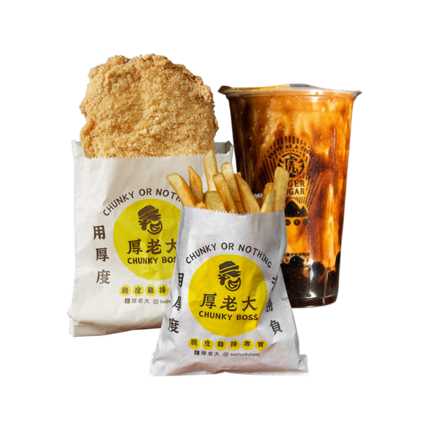 Fried chicken, fries, and bubble tea from Chunky Boss. Food is in white paper bags with a yellow logo, and the drink is in a clear cup.