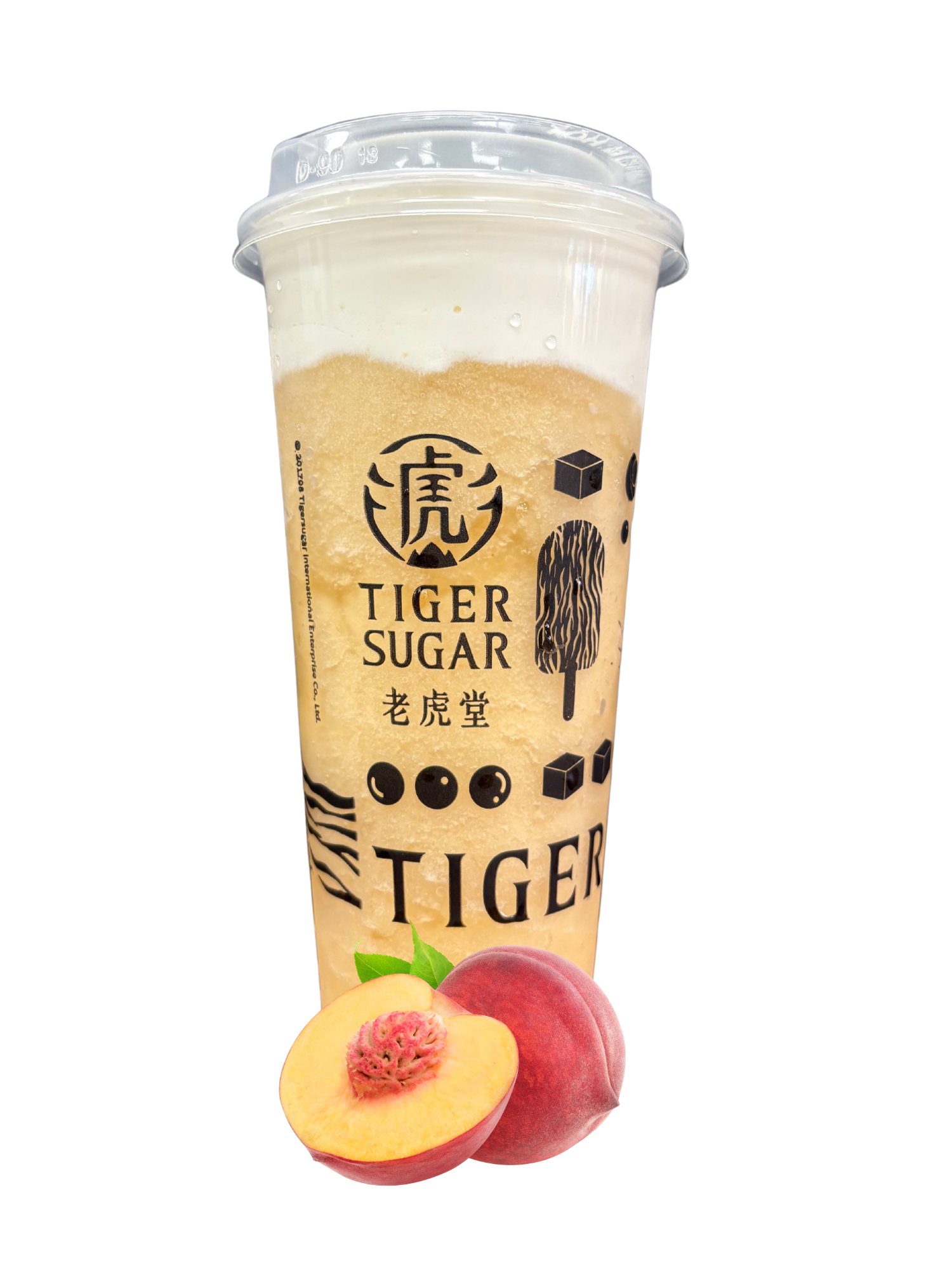Tiger Sugar peach drink with a sliced peach; light orange drink with cream topping, clear cup.