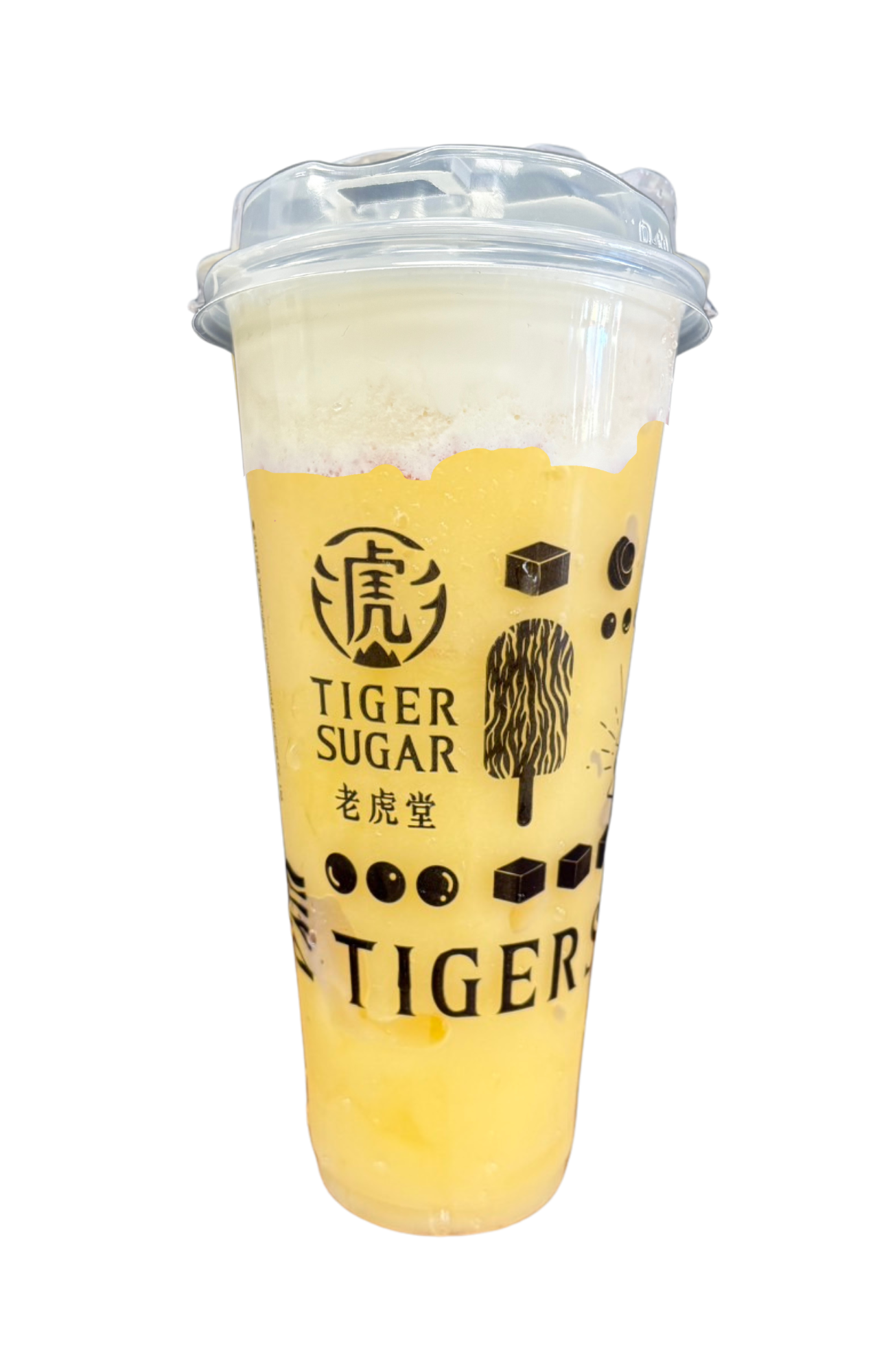 A cup of Tiger Sugar drink with yellow liquid and white foam, sealed with a clear plastic lid. The cup has a logo and black dots.