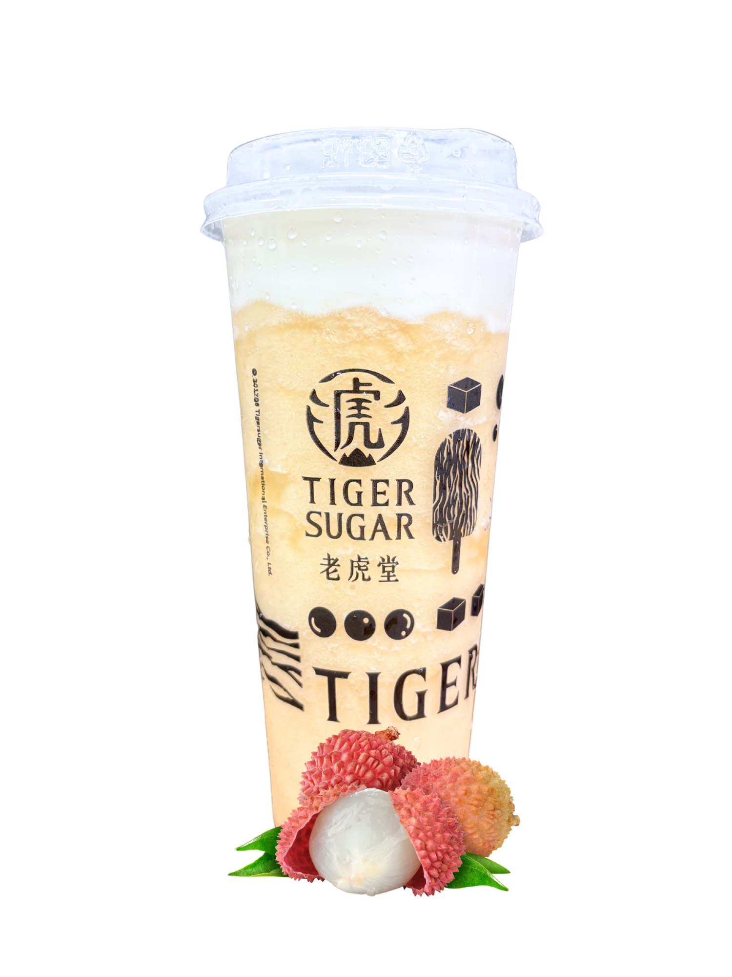 A Tiger Sugar lychee drink with a white foamy top, lychee fruits in the foreground. The cup has branding on it.