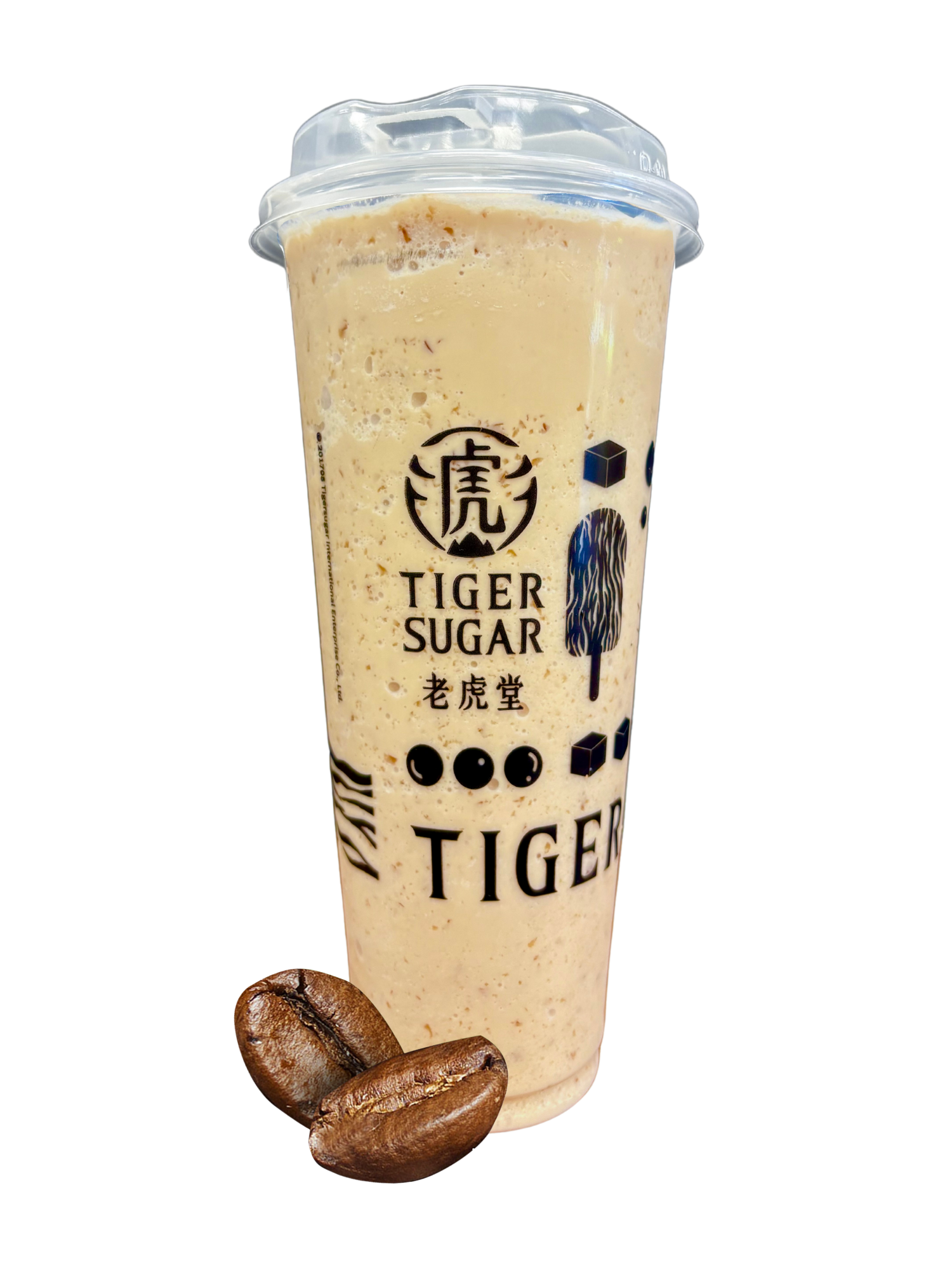 A tall, blended coffee drink from Tiger Sugar with coffee beans in front. The drink is light brown with a plastic lid.