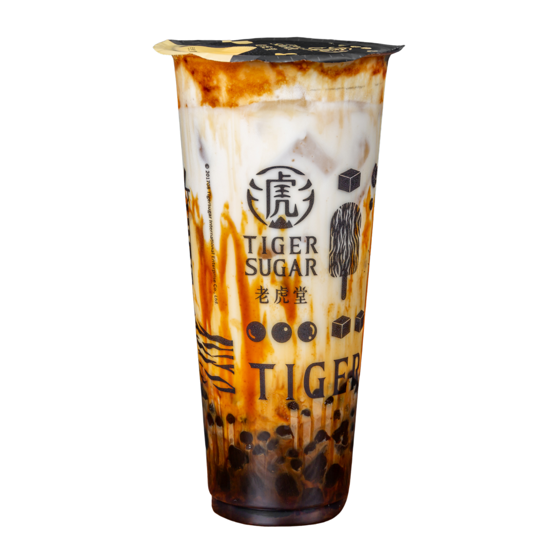 Tiger Sugar brown sugar boba drink with brown sugar stripes on the cup, milk and ice.