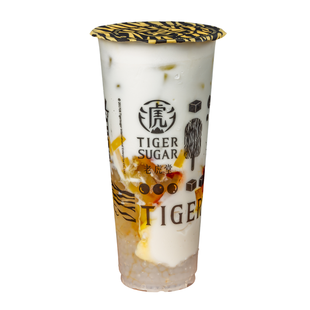 A tall Tiger Sugar drink in a clear cup with a leopard print lid. Layers of drink and toppings are visible.