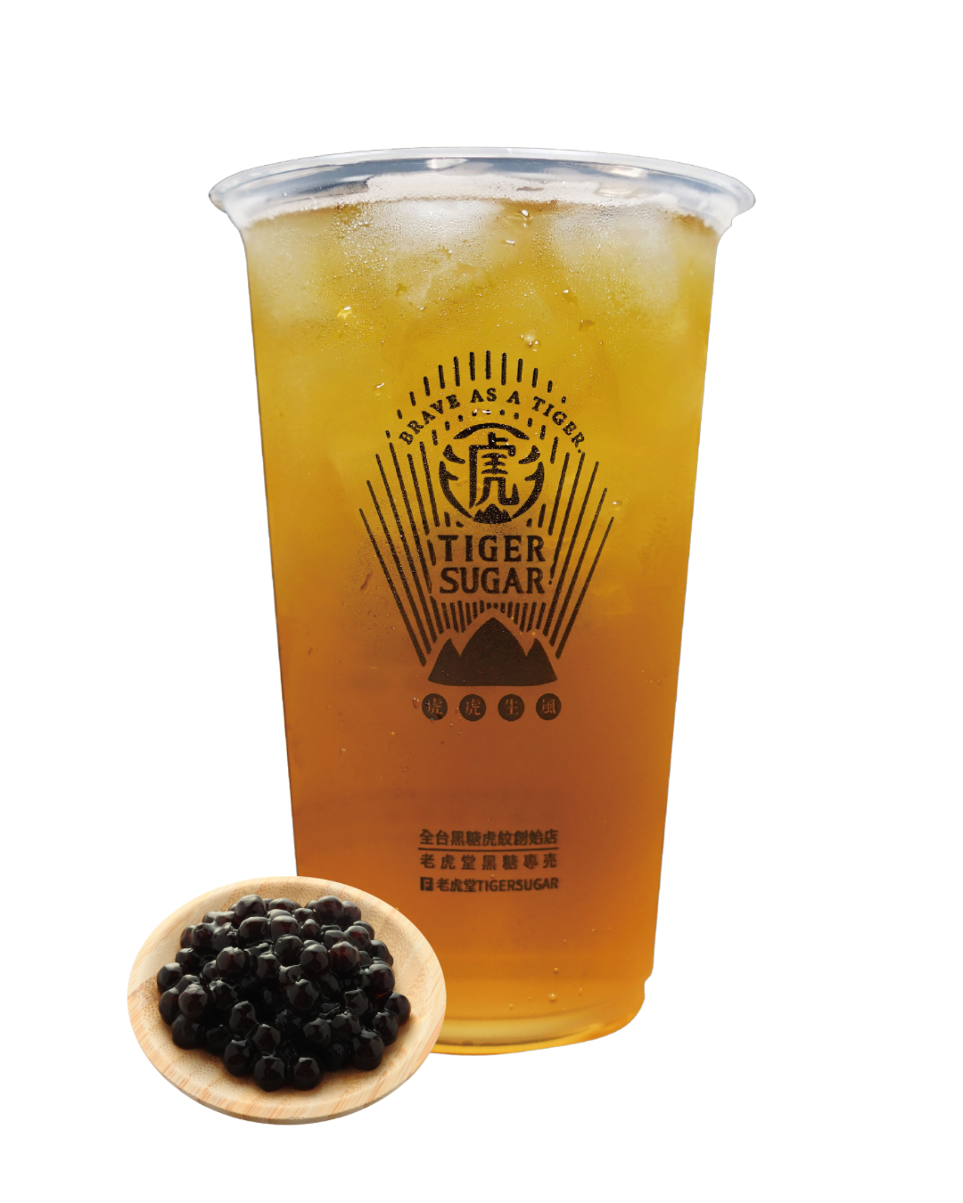 Iced Tiger Sugar drink with tapioca pearls in a small wooden bowl. The beverage is amber-colored, in a clear plastic cup with the Tiger Sugar logo.