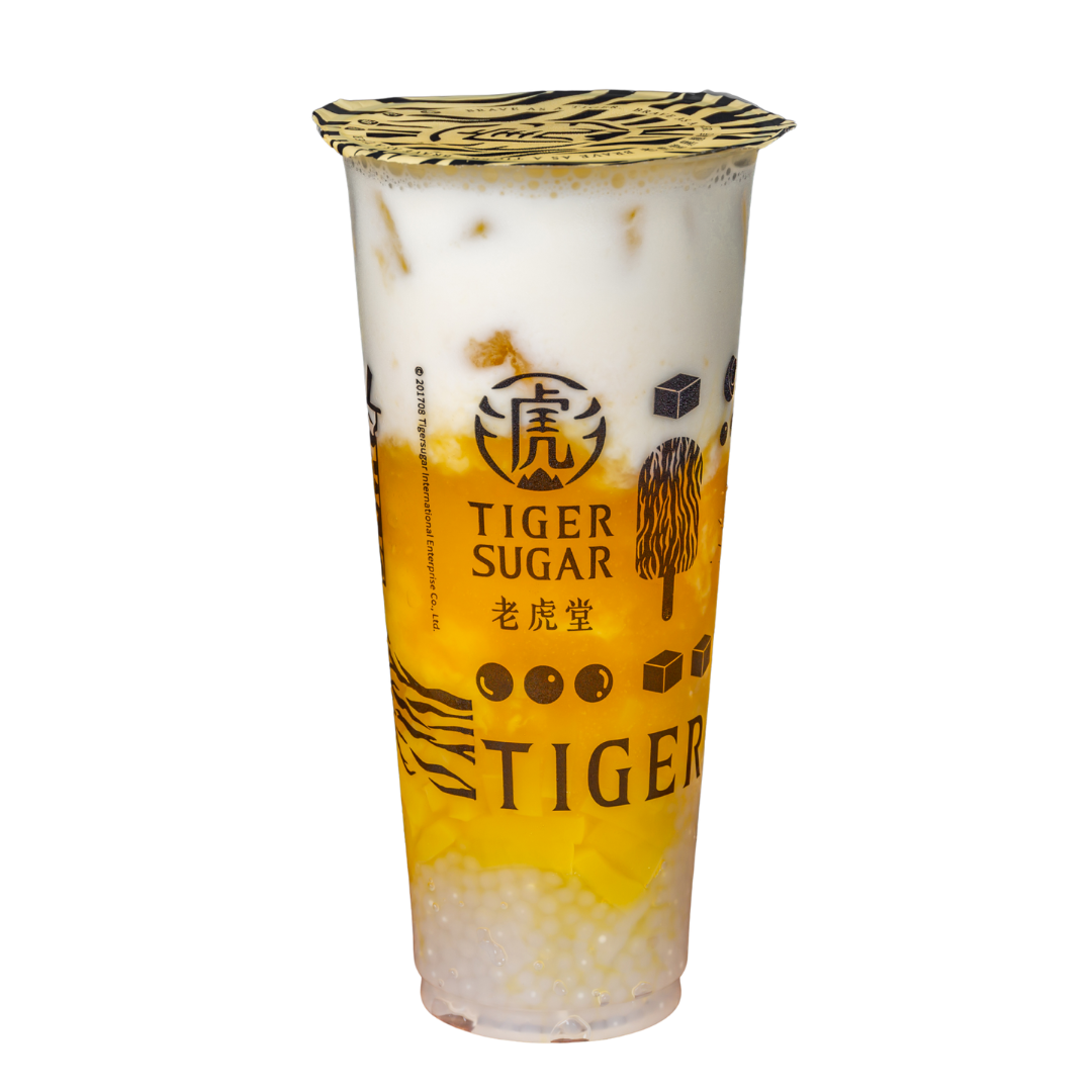 Tiger Sugar Mango Boba drink in a clear plastic cup, layered with mango, white cream, and boba. The cup has the Tiger Sugar logo.