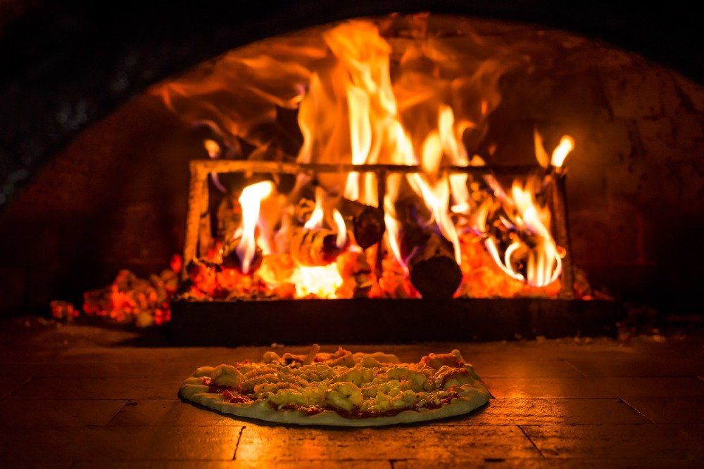 pizza baked in a wood-fired oven