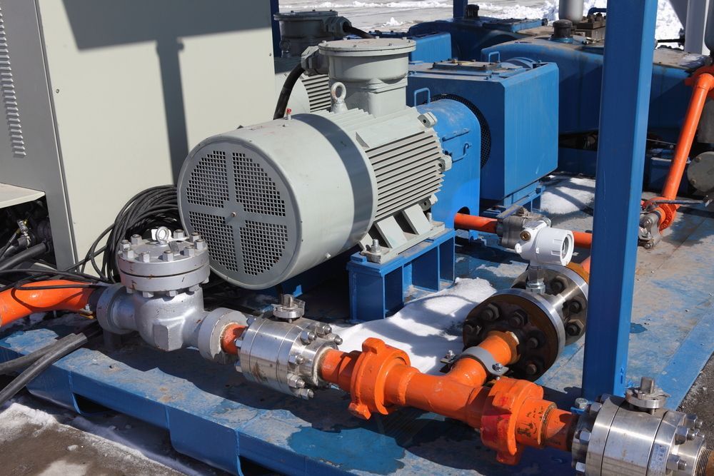 A Close Up of a Machine With a Motor and Pipes — Davidson's Electrical In Central Highlands, QLD