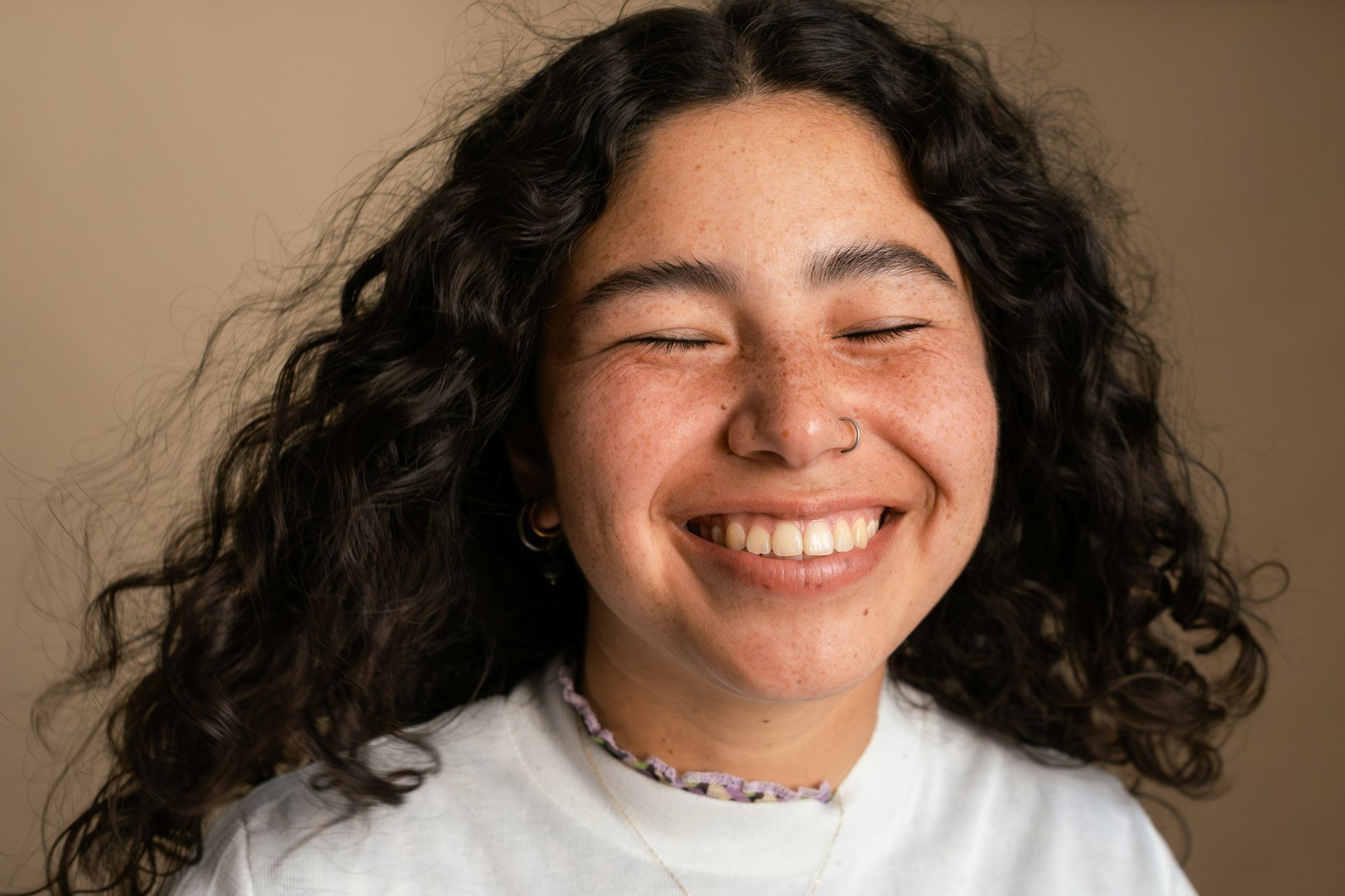 An aerial view of a boat floating on top of a large body of water.