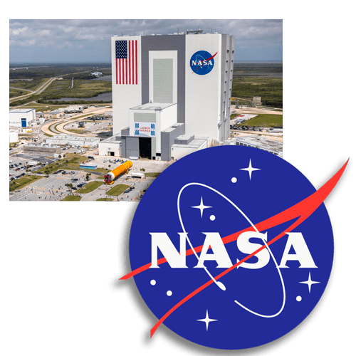 NASA logo superimposed on a view of the Vehicle Assembly Building, with American flag.