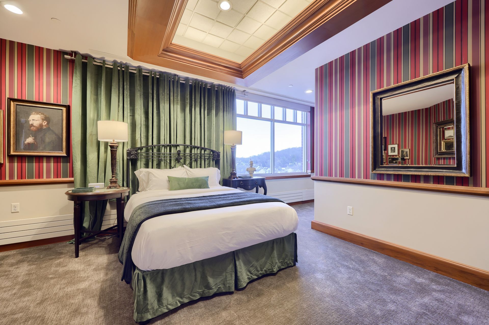 There is a large bed in the middle of the room.