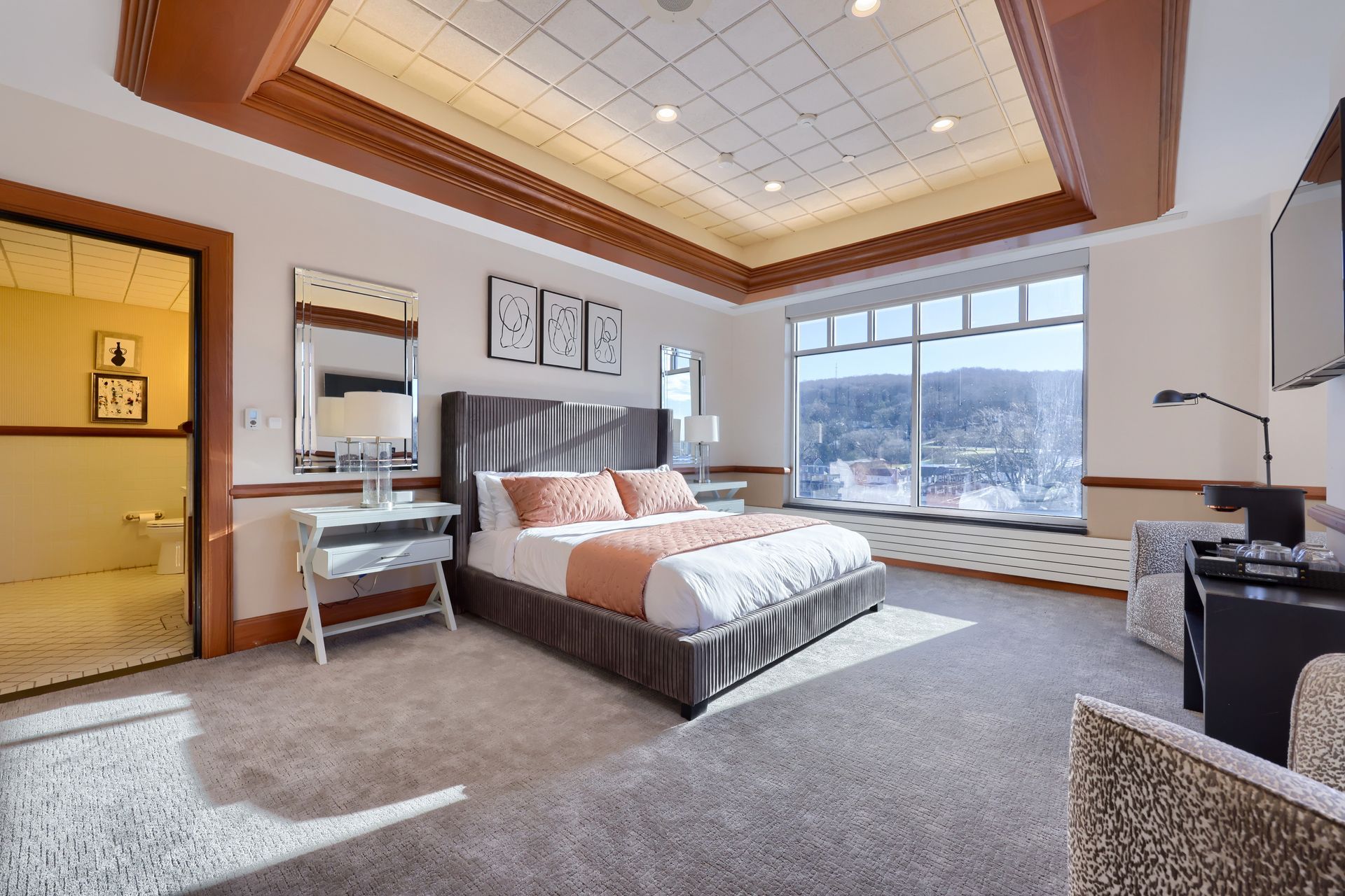 There is a large bed in the middle of the room.