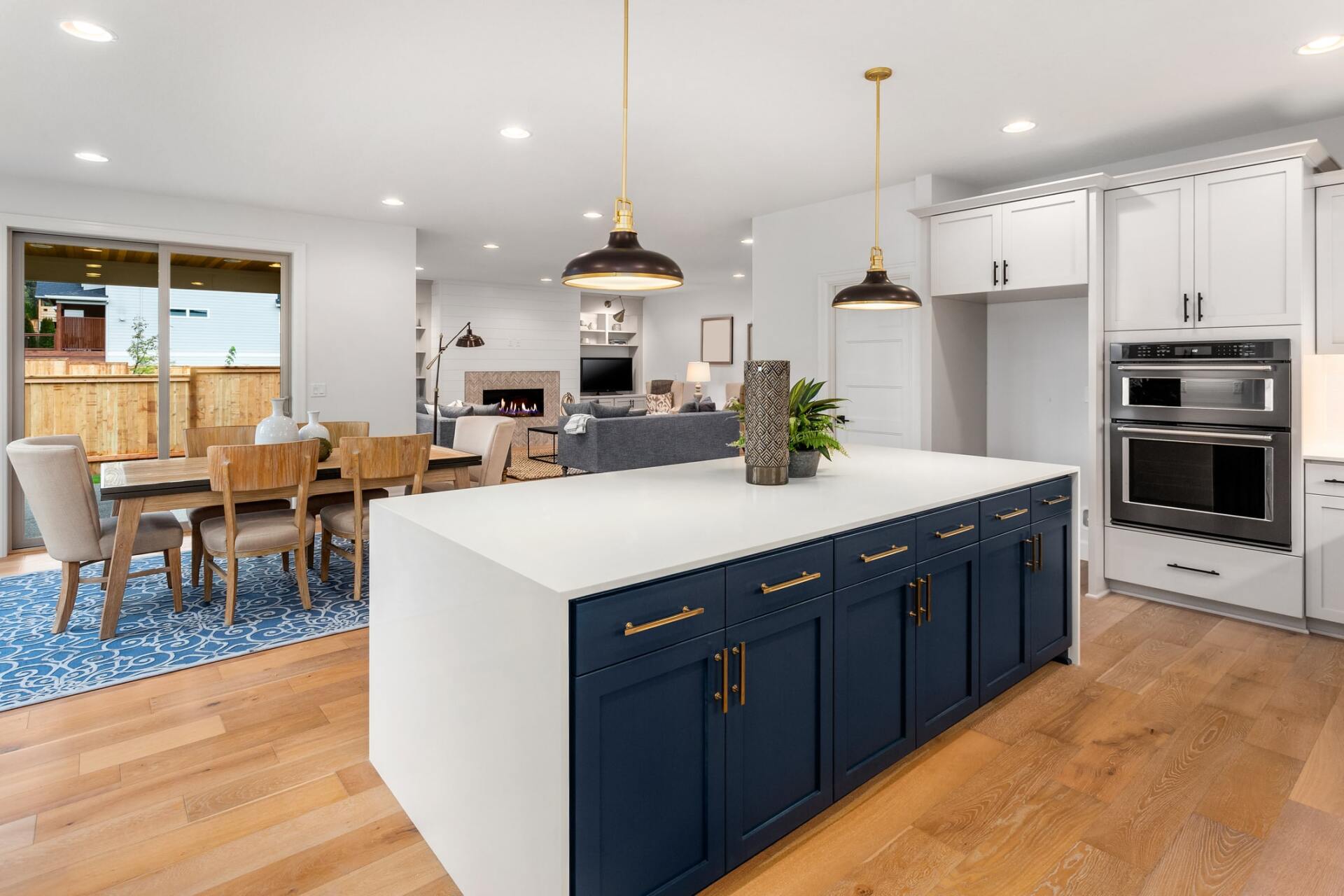 custom kitchen remodel with kitchen island and white and blue cabinets