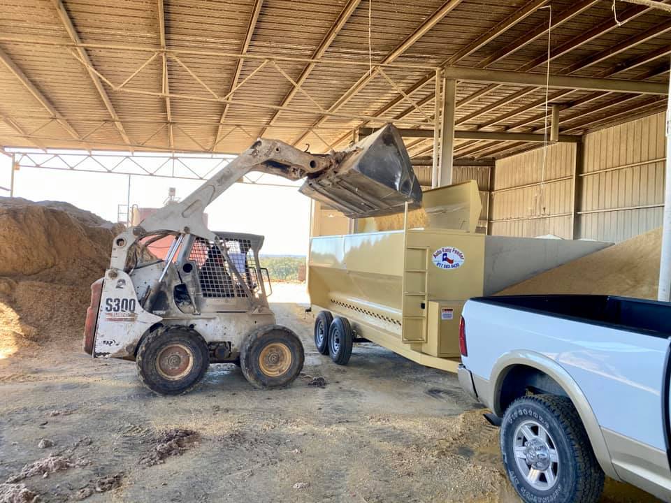 Putting Feeds Into Livestock Feeder — Arlington, TX — Auto Easy Feeder