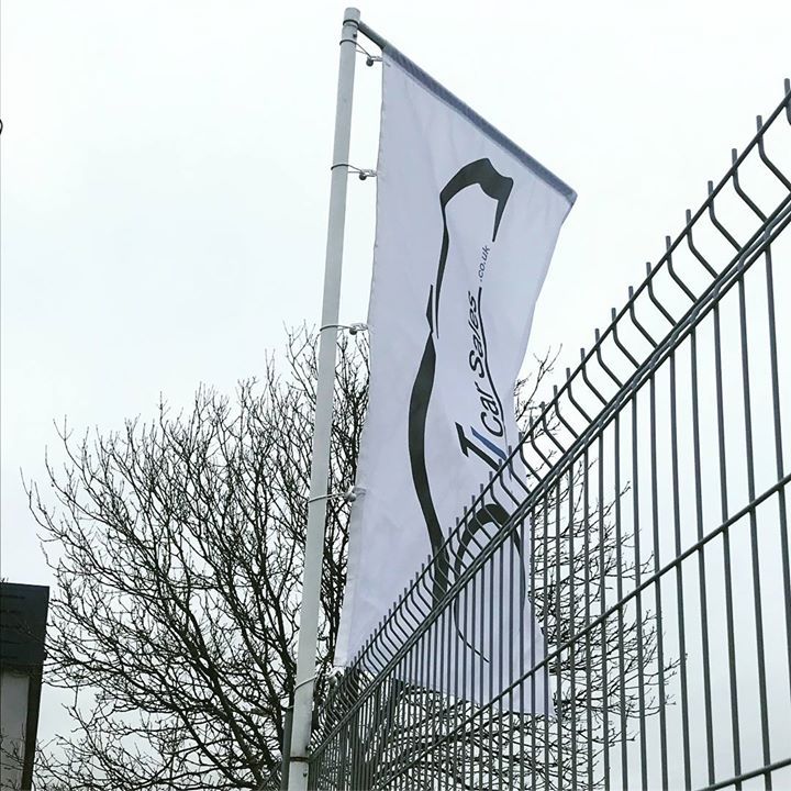 TJ Car Sales. Forecourt Flag poles and flags Bridgend