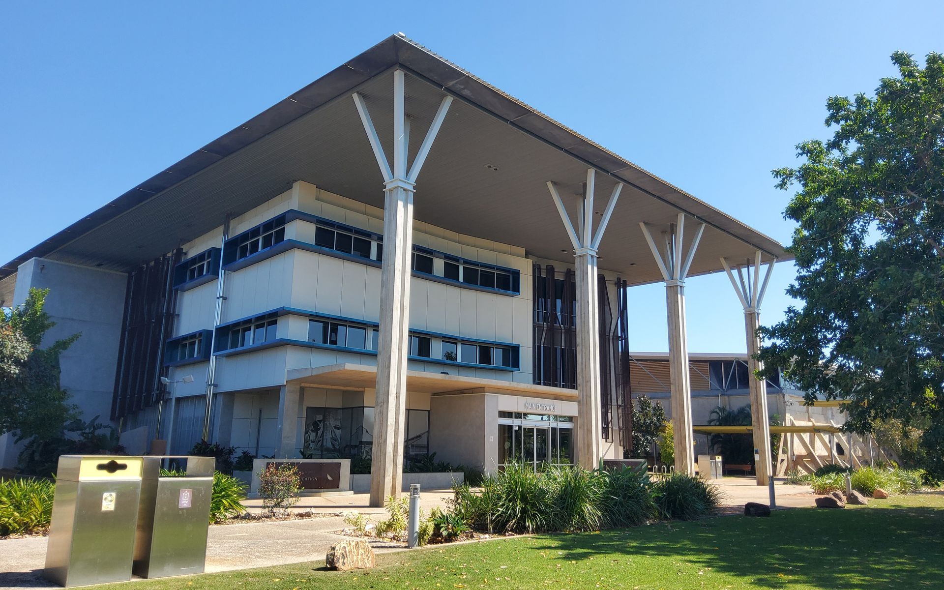 Three-story Building With a Large Overhanging Roof — Neil Griffiths Rendering in Berry Springs, NT