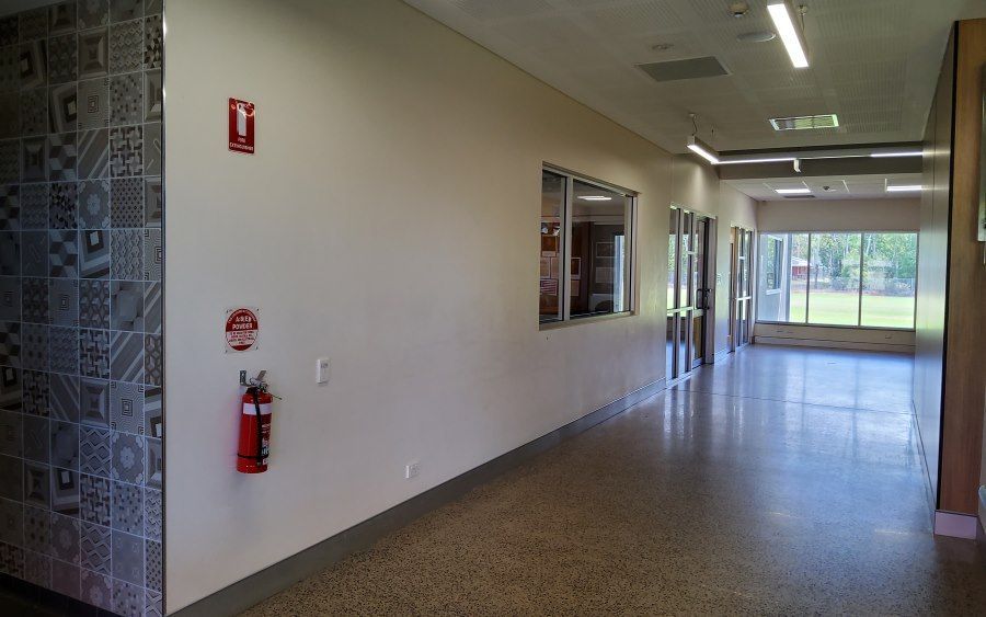 Hallway With a Textured Wall on the Left, Windows — Neil Griffiths Rendering in Berry Springs, NT